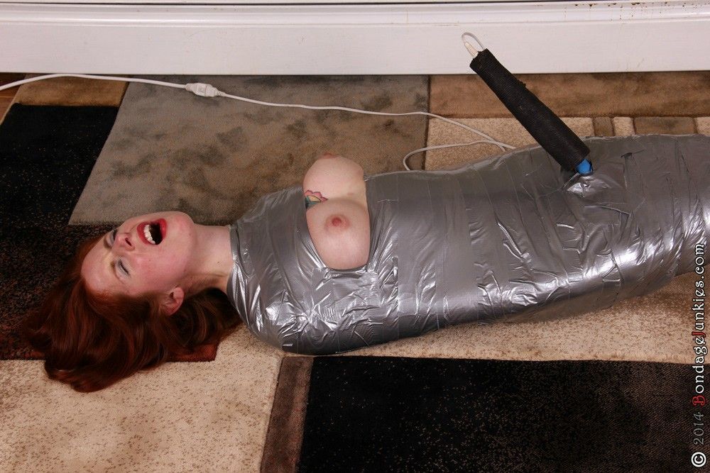 Teen girl duct taped saran wrapped nude