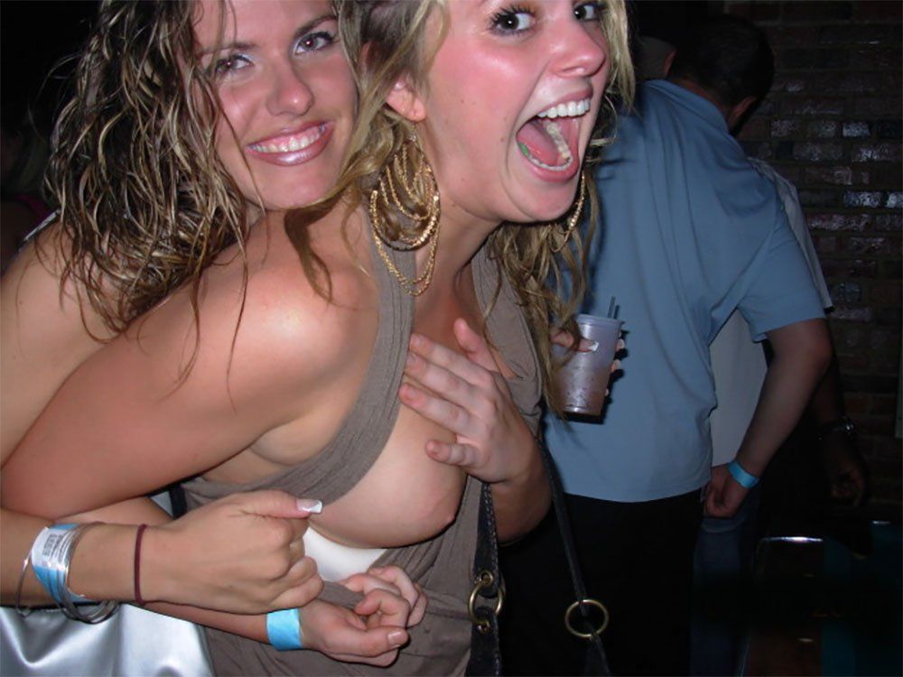 Shows boobs to friends